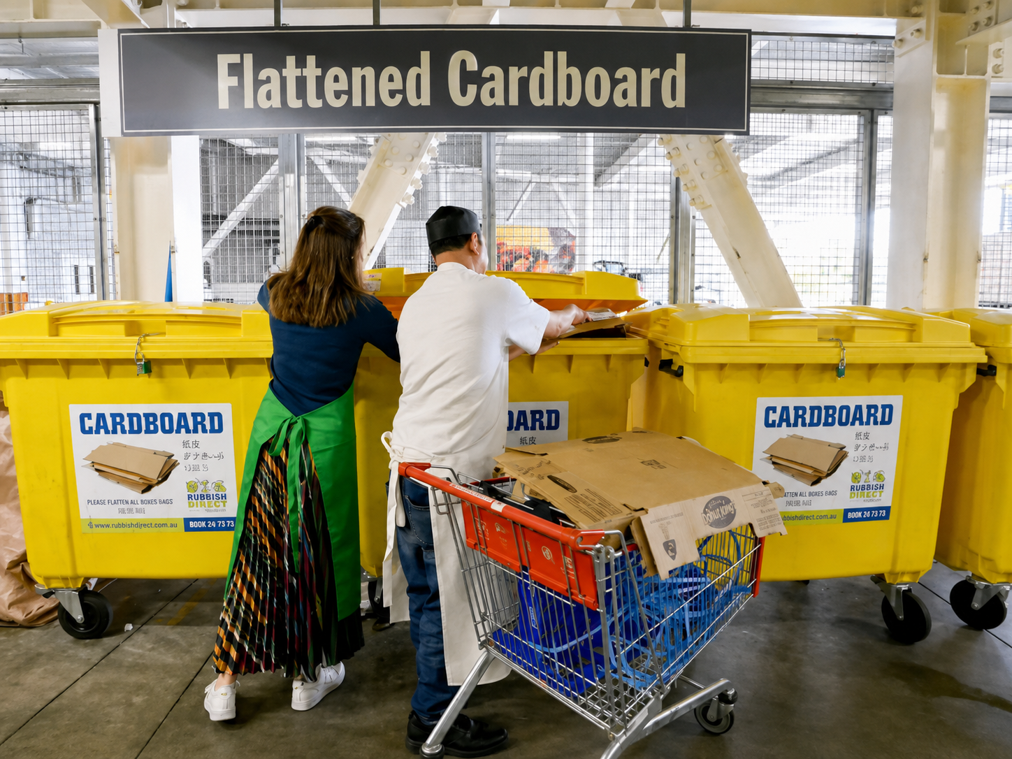 People Using Dedicated Cardboard Recycling Bins