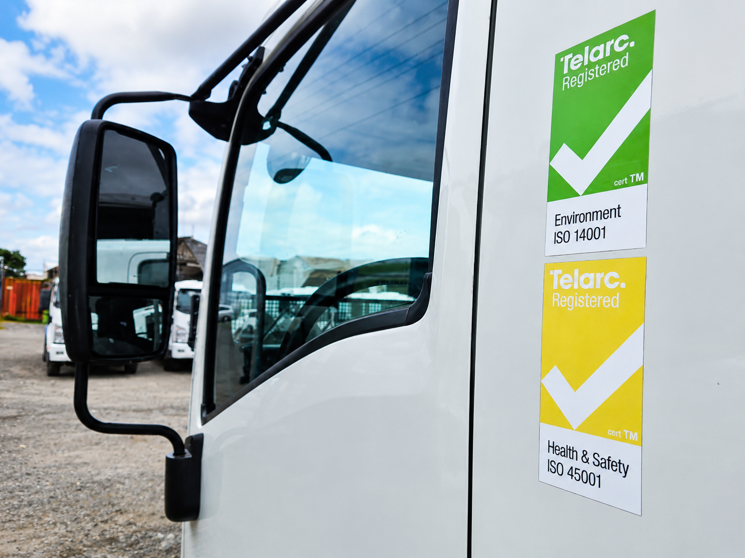 White Truck Cab Door with Large Side Mirror and Telarc Iso Stickers green 14001 Yellow 45001 on the Panel