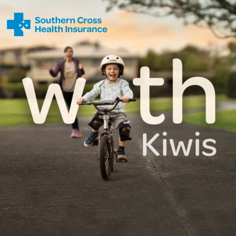 Benefits health insurance squarewebp | Rubbish Direct Child on a Helmeted Bicycle Rides Toward the Camera on a Park Path Blurred Adult in Background with Southern Cross Health Insurance Logo and with Kiwis Text